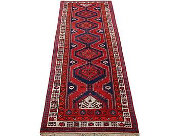 A runner carpet, Ardebil, c. 392 x 103 cm.