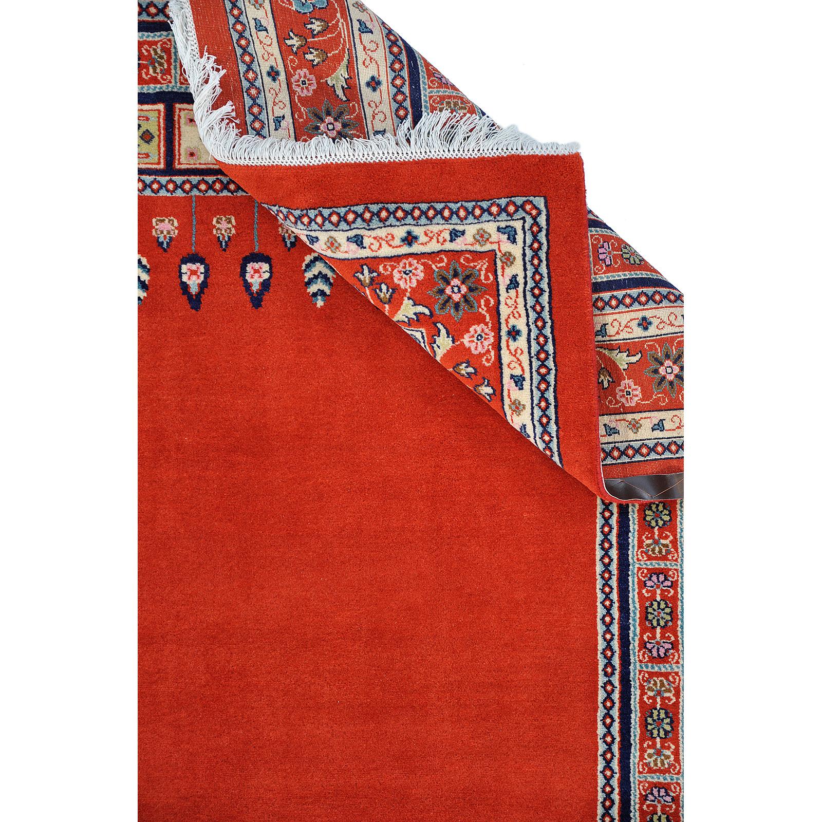 A Persian carpet, approximately 295 x 200 cm.