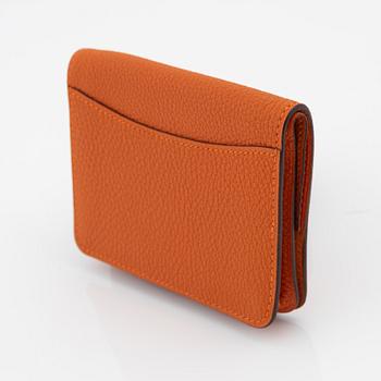 Hermès, a orange leather 'Dogon' wallet, 2003.