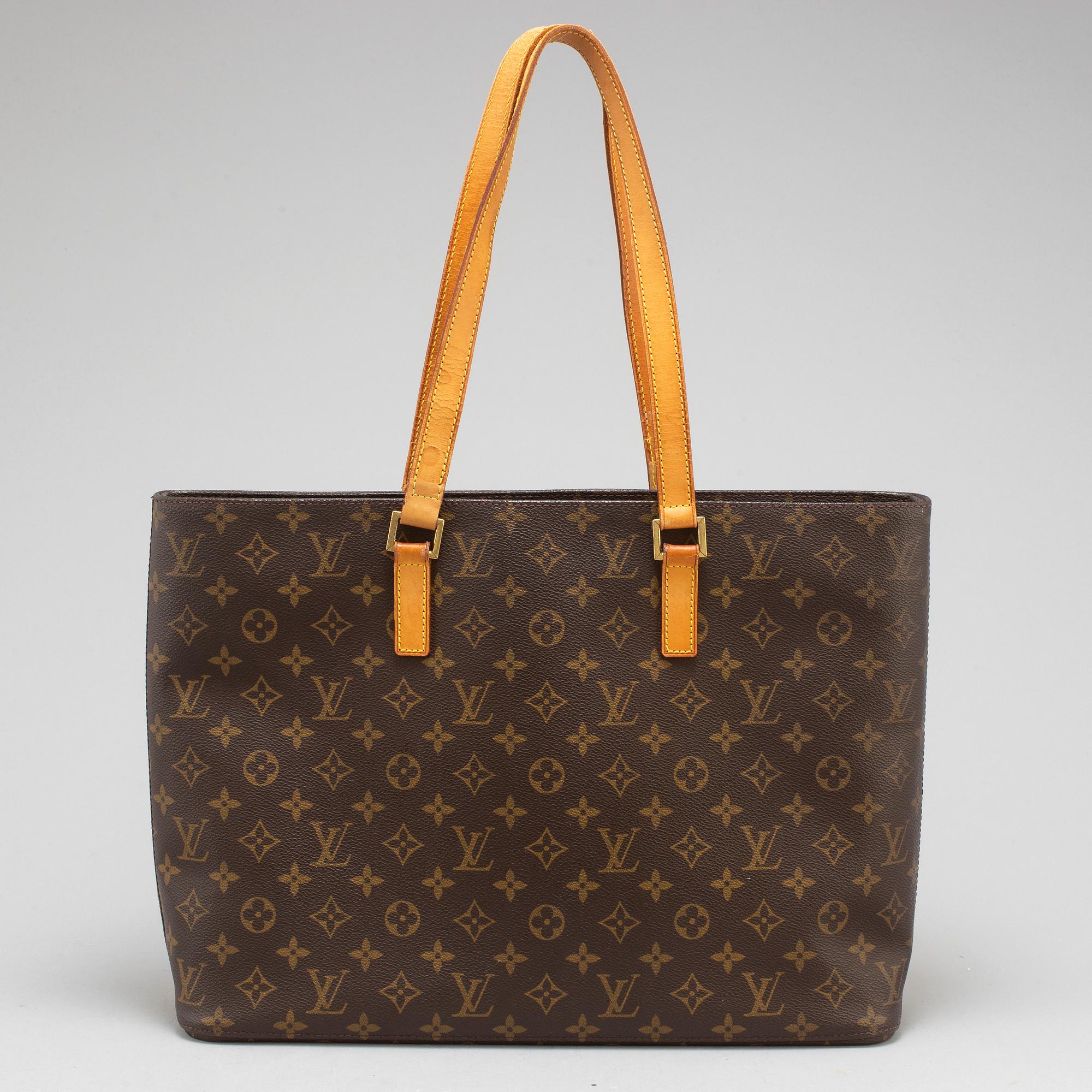 LOUIS VUITTON, a monogram canvas 'Luco' bag.