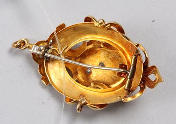 BROSCH/HÄNGE, 18k guld med pärla.