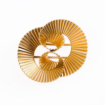 CARTIER, A 14K gold brooch . Marked 289C.