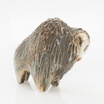 Taisto Kaasinen, A stoneware figurine, signed TK Arabia, 1960s-70s.