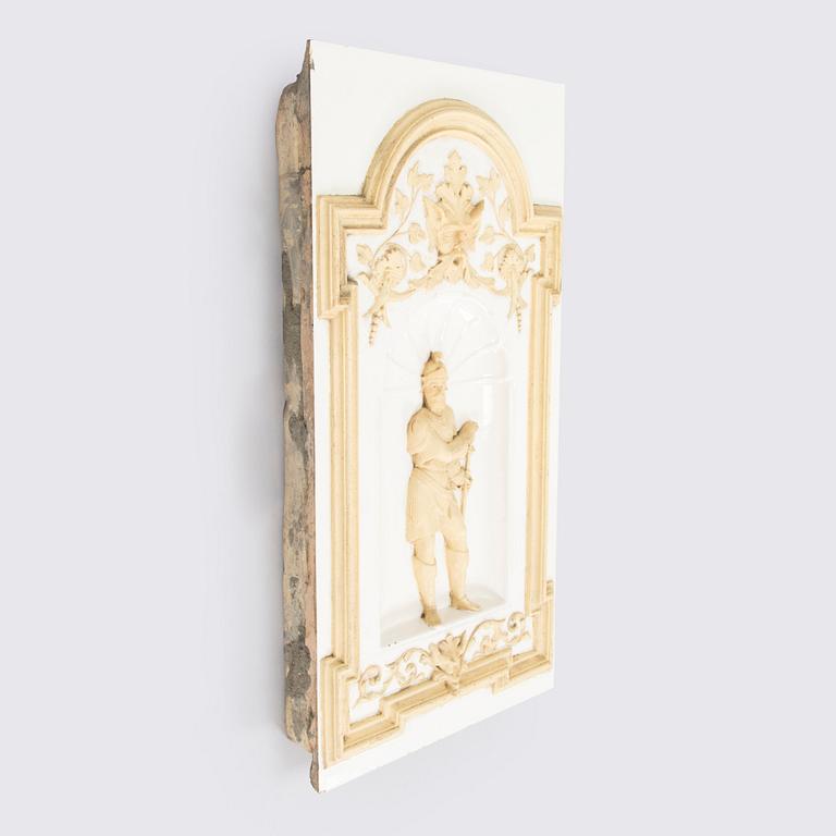 Reliefi / koriste-elementti kakluuniin Wilhelm Andstén, Helsinki, 1800-luvun loppu.