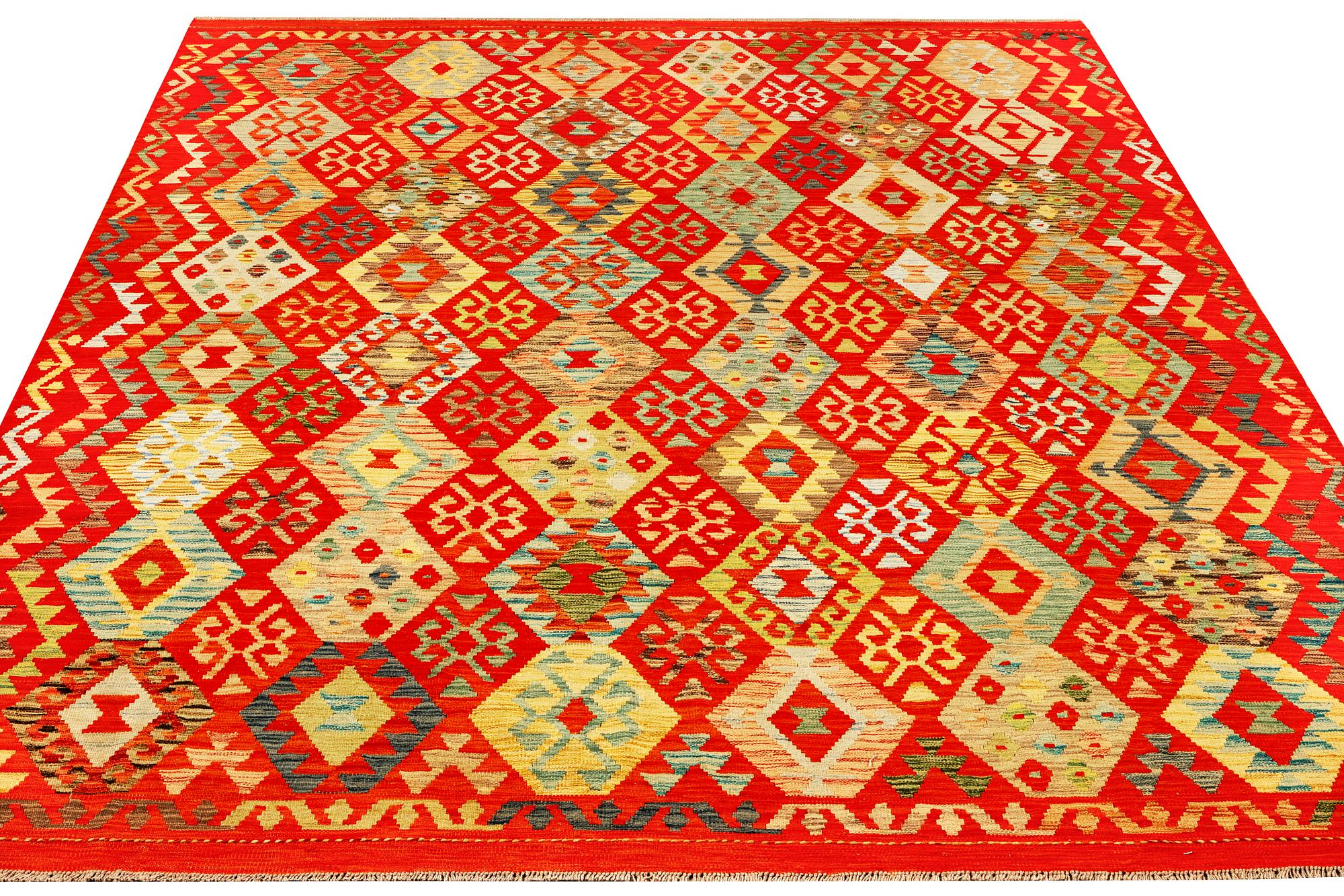 A Kilim carpet, Afghanistan, c. 298 x 251 cm.
