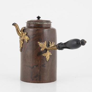 A Swedish copper and brass rococo coffee pot, later part of the 18th century.