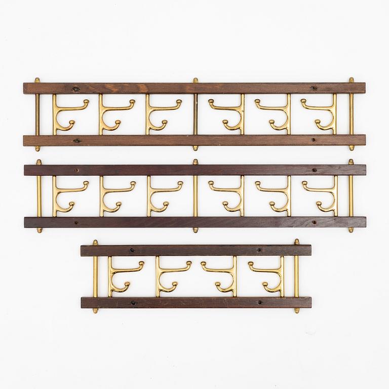 A set of three 'Dekorativ' coat hangers, Skoglunds metallgjuteri, Anderstorp, 1950's/60's.