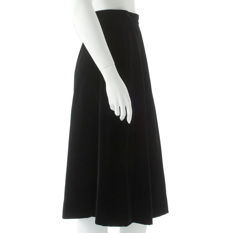 YVES SAINT LAURENT, a black velvet skirt.