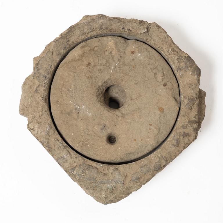 A Swedish grain mill, dated 1673.
