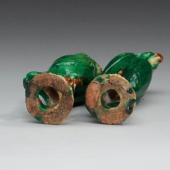 A set of two green glazed falcons, China.