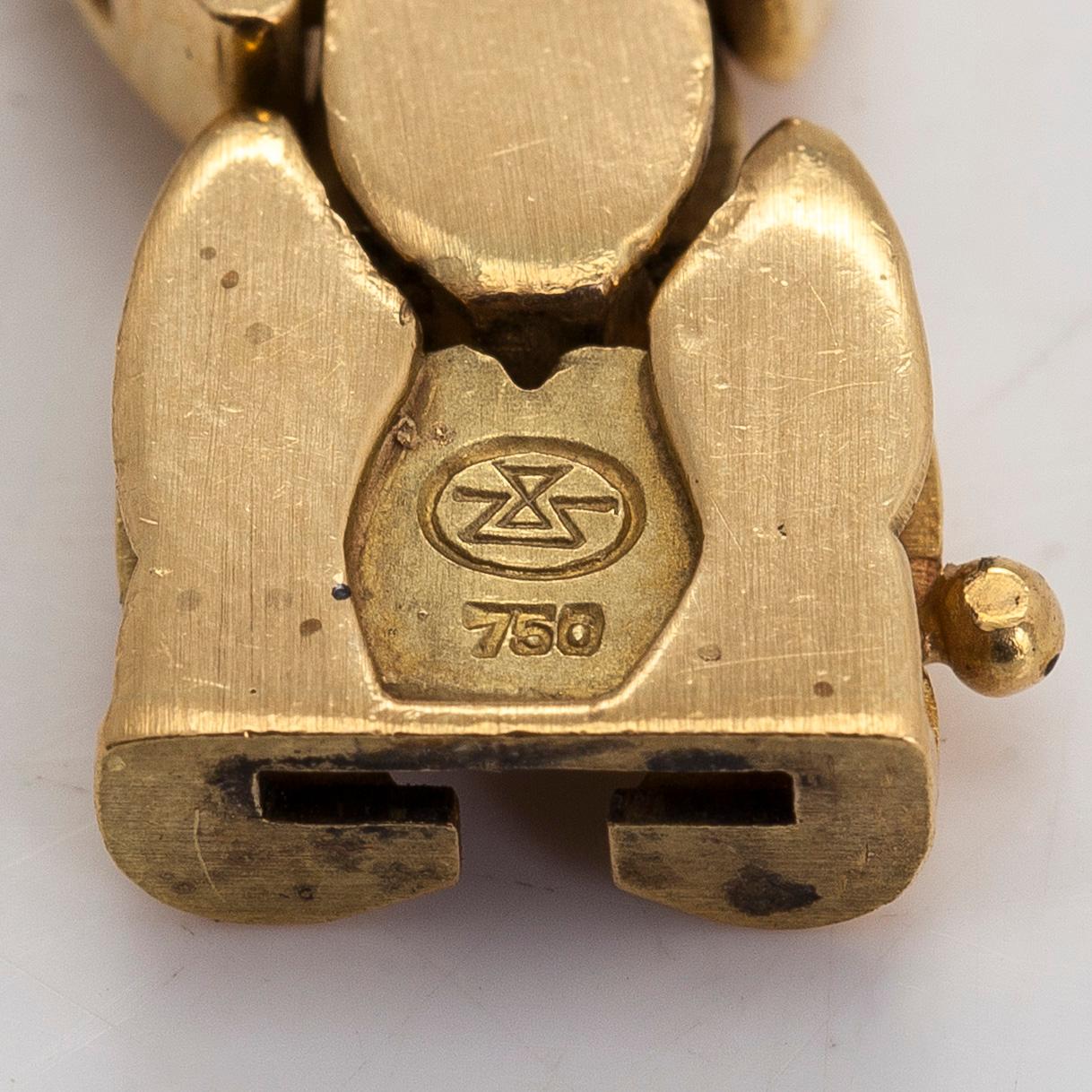 Armband i 18K guld. Schweiz.