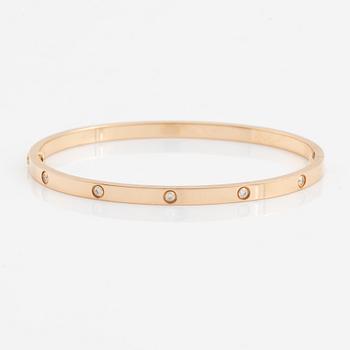 Cartier "Love" liten modell armband 18K roséguld med tio runda briljantslipade diamanter.