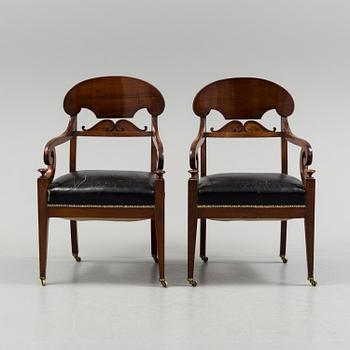 A pair of early 19th century mahogany  Empire armchairs, presumably from the Baltic countries.