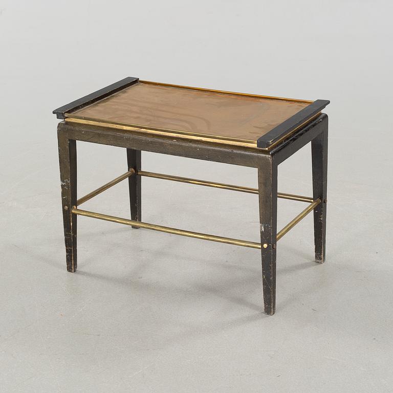 A tray table from the first half of the 20th century by Ystad Brons.