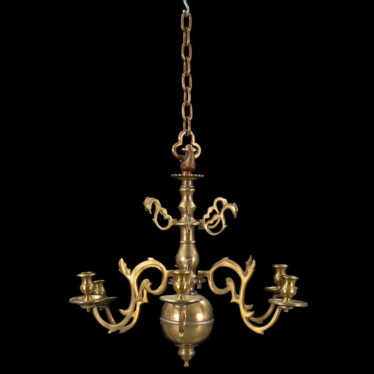 A baroque brass chandelier, first half of 18th century. Height (ink chain) 70 cm.