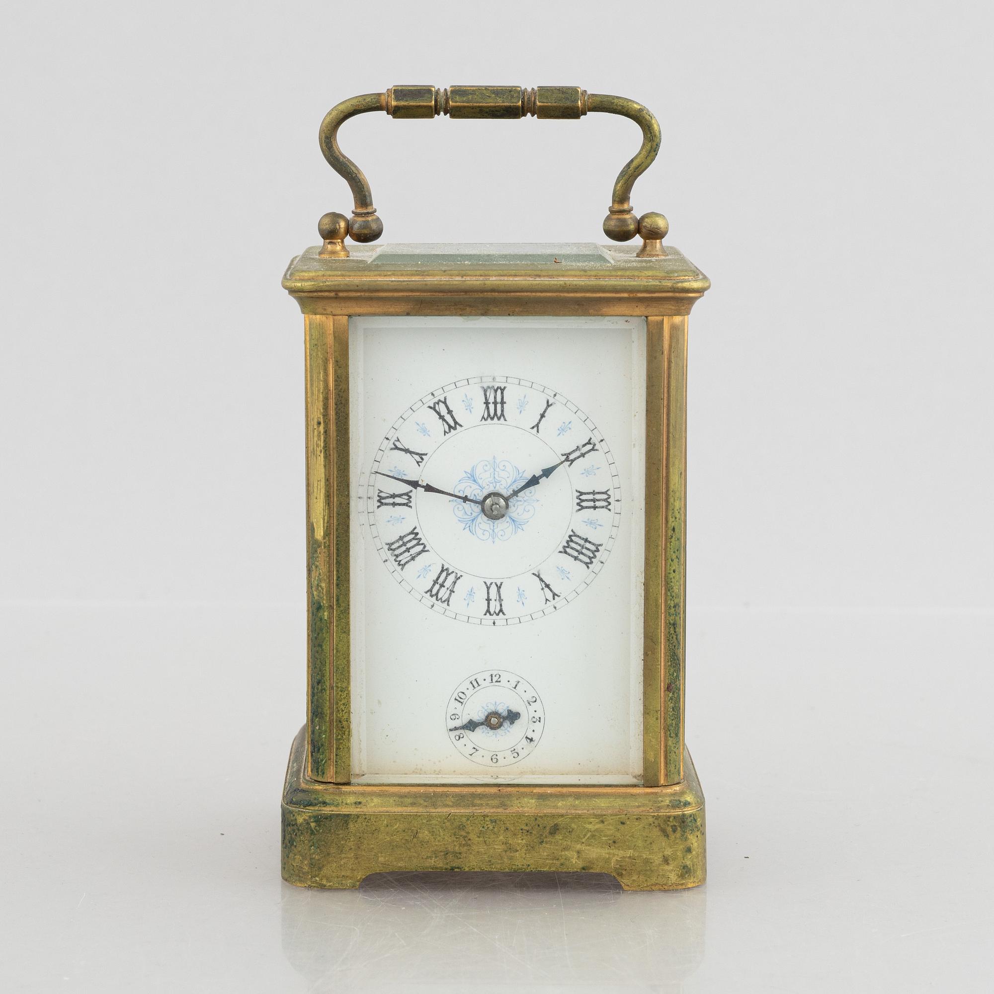 A carriage alarm clock, around 1900.