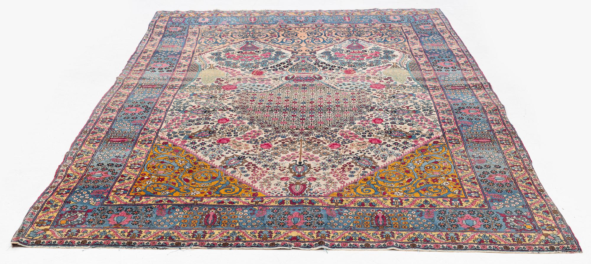 An antique Tehran carpet, north Persia, c. 323 x 195 cm.