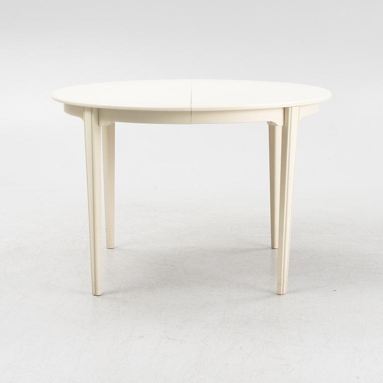 A Gustavian style table with four chairs, second half of the 20th century.