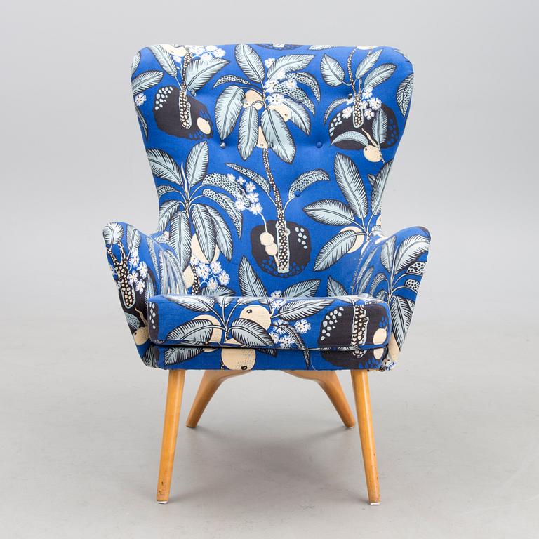 A mid-20th century armchair 'Siesta' manufacturer  Puunveisto Oy - Träsnideri Ab, Finland.