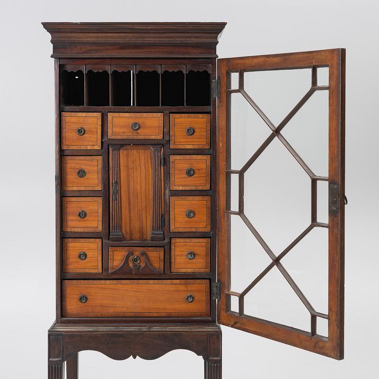 Display cabinet, likely England 19th century.