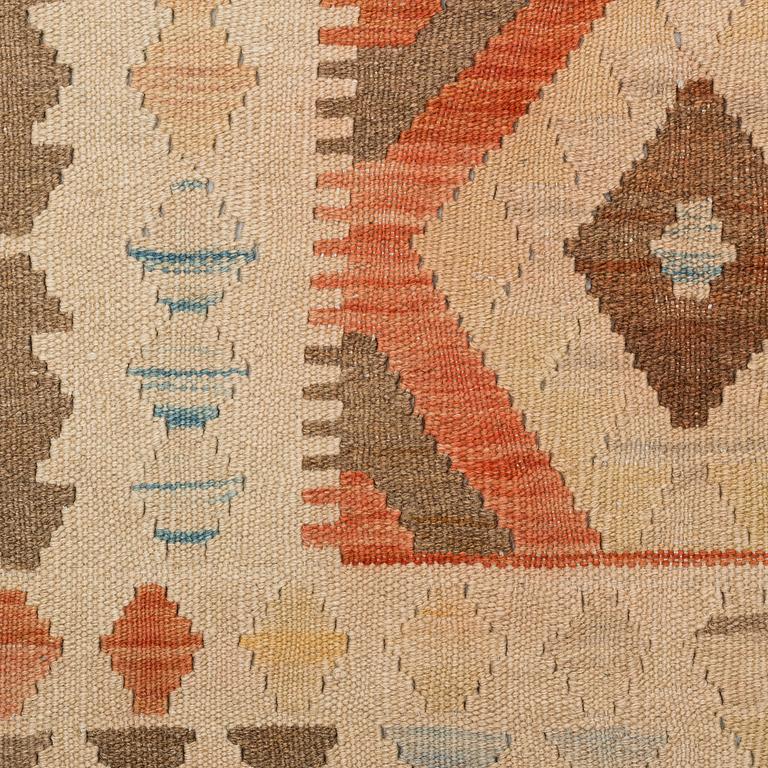 a carpet, kilim, around 298 x 196 cm.