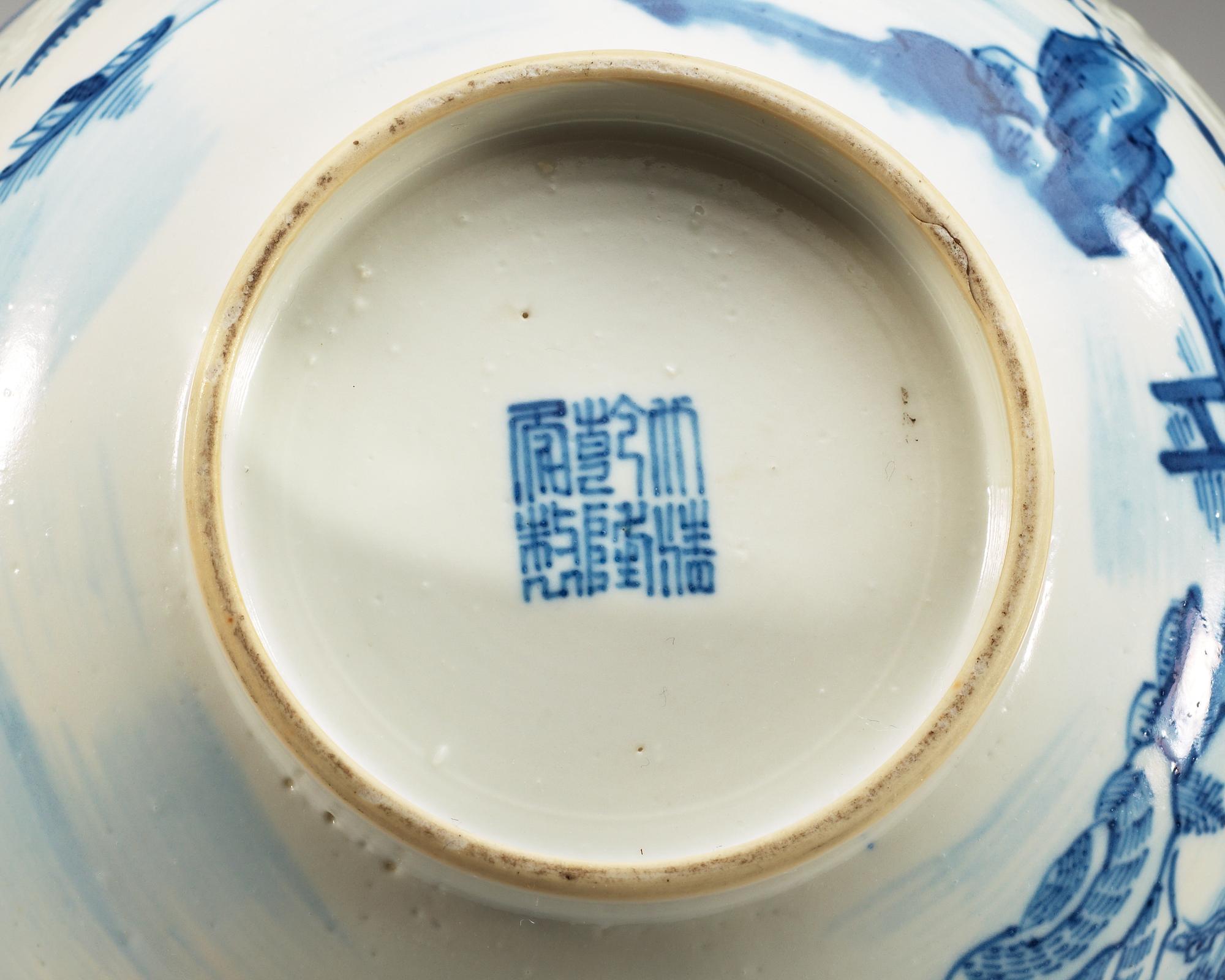 A blue and white bowl, Qing dynasty, 19th Century with Qianlong seal mark.