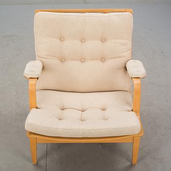 FÅTÖLJ. "Ingrid", Bruno Mathsson för DUX, 1900-talets andra hälft.