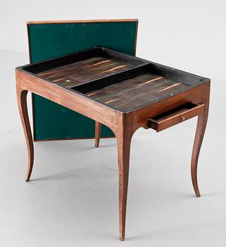 A Rococo game table.