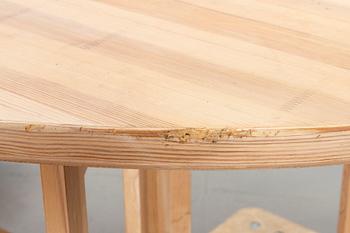 A PINE WOOD FOLDING DINNER TABLE DESIGNED BY OLOF PIRA.