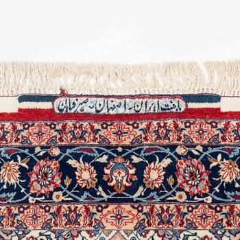 A Seirafian Esfahan rug, signed (Ahmad) Seirafian, ca 178 x 110 cm (as well as one end with 3 cm flat weave).