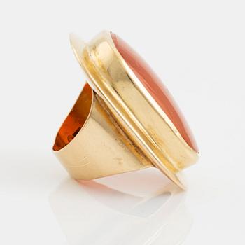 An 18K gold and carnelian ring.
