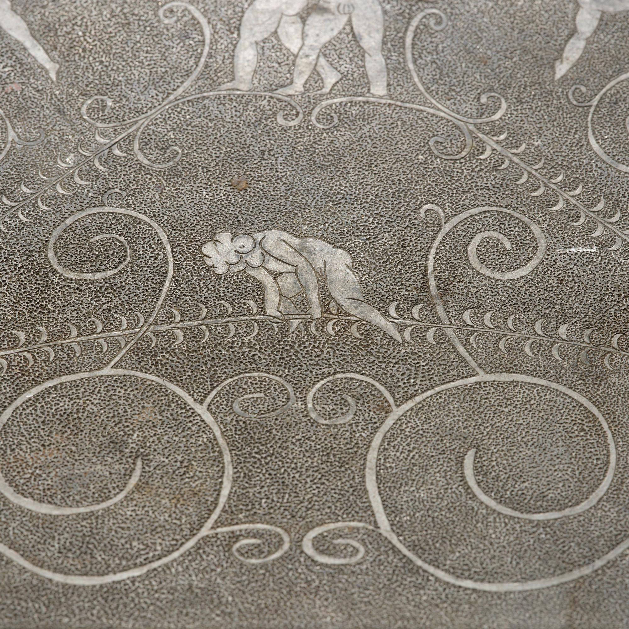 Anna Petrus, a pewter top tray table on a base by Uno Åhrén, executed in her studio, Stockholm, ca 1922-25.