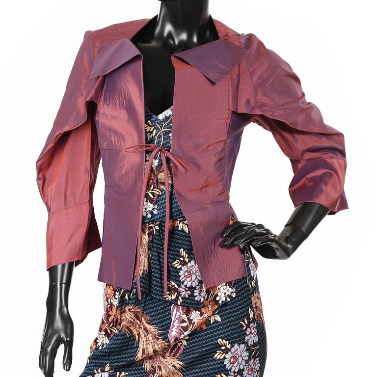VIVIENNE WESTWOOD, a three-piece ensemble consisting of jacket, top and skirt.