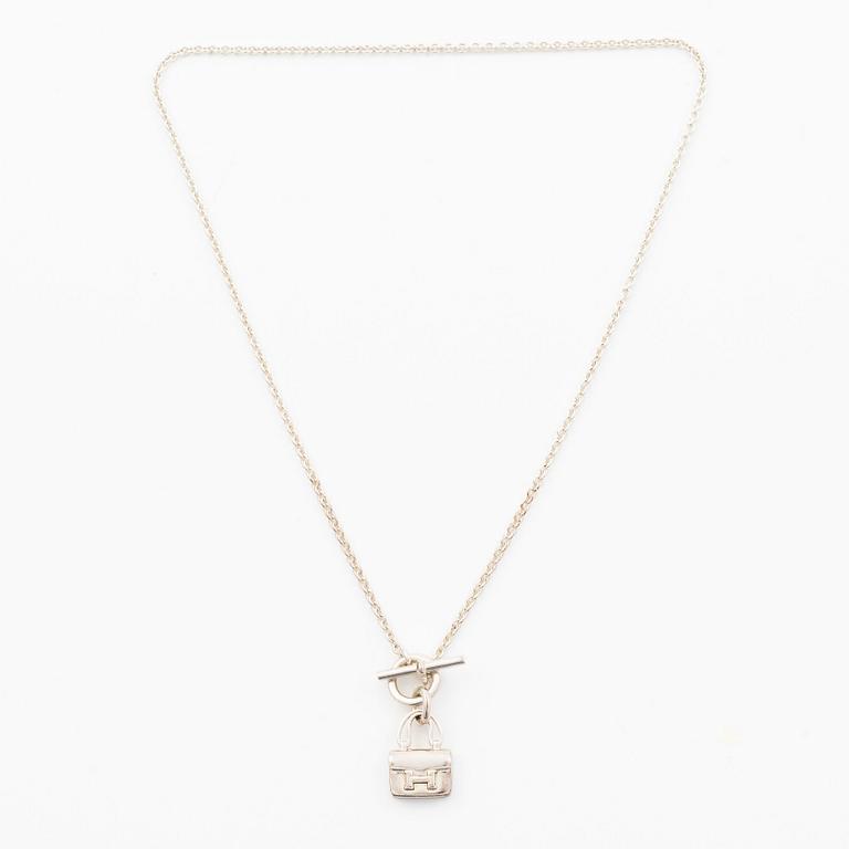 Hermès, Necklace / collar with charm, "Amulettes Constance", silver 925.