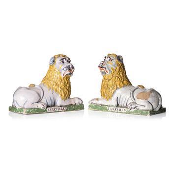 449. A pair of Luneville recumbent lions, circa 1780-1800.