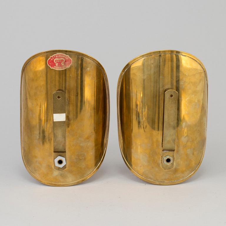 A pair of brass wall sconces from Odel Messing, Norway, second half of the 20th century.