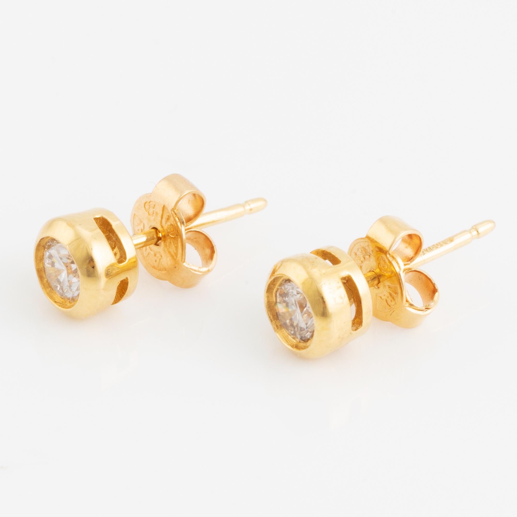 Brilliant cut diamond earrings, total ca 0,50 ct.