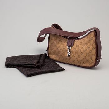 a GUCCI bag.