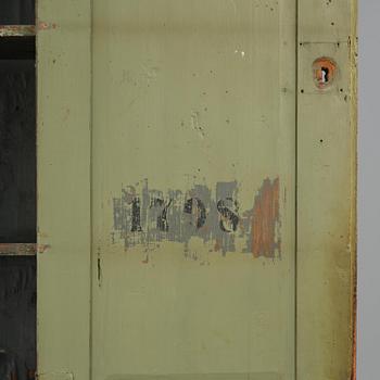 A Swedish polychrome-painted rococo cabinet, late 18th century.