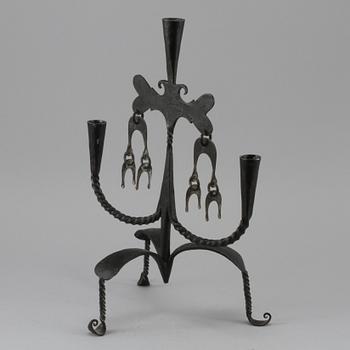 LJUSSTAKE, smide, 1900-tal.