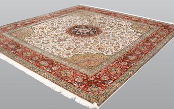 A part silk Tabriz carpet, sk 50 Radj, ca 312 x 296 cm.
