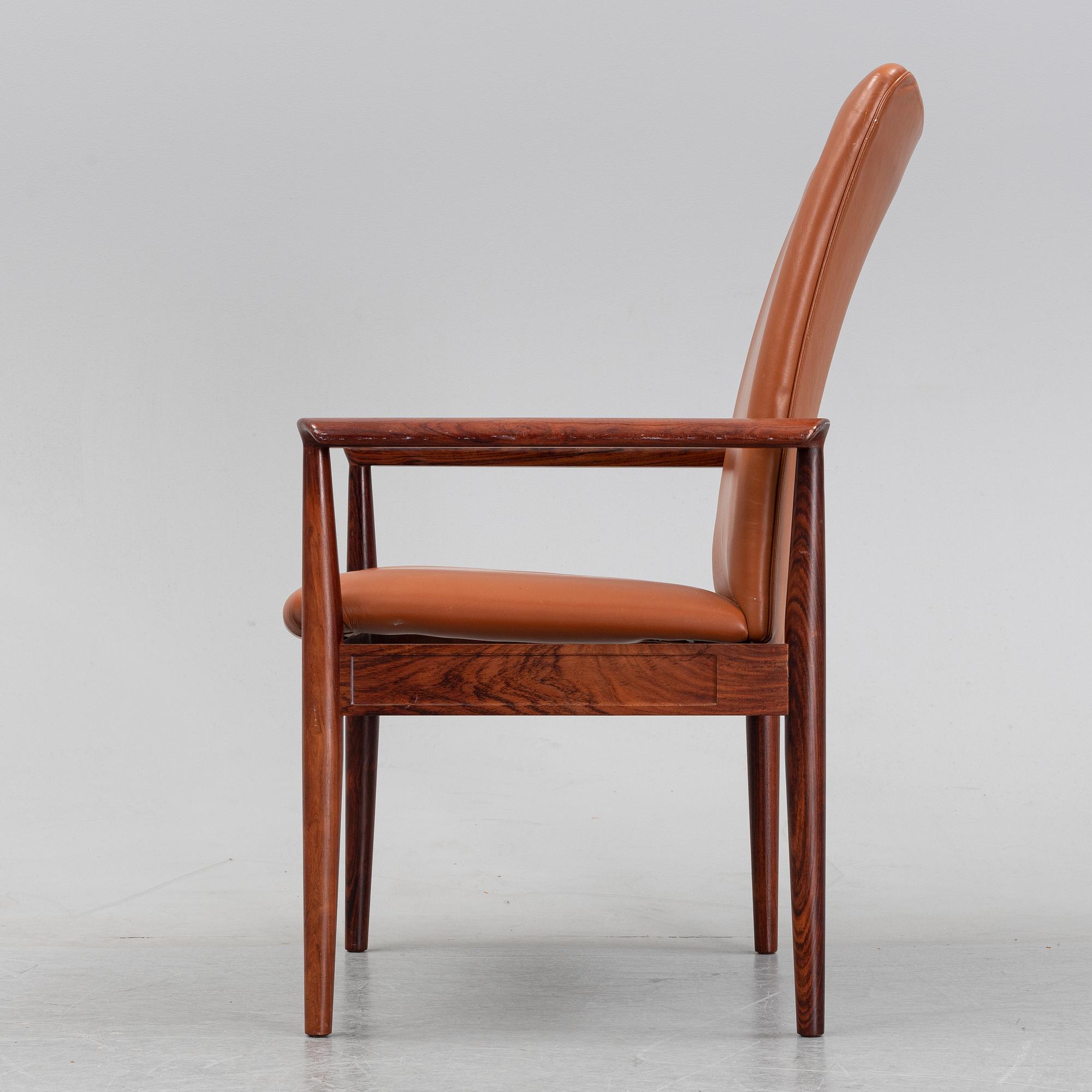 Finn Juhl, a rosewood easy chair, from Cado, Denmark, 1960's/70's.