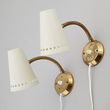 A pair of wall lights from Elidus, Fristad.