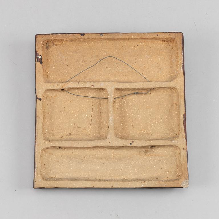 A stoneware wall relief by Åke Holm, signed.