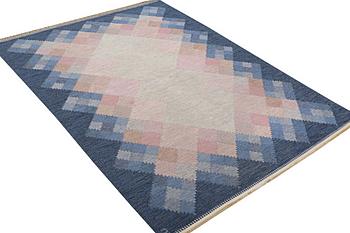 A flat weave carpet, signed S, ca 237 x 166 cm.