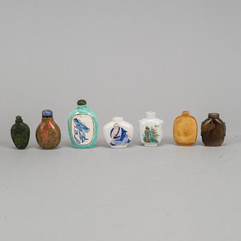 A group of seven stone, ceramic and porcelain snuff bottles, Qing dynasty and China, 19th-20th century.