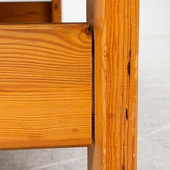 A 1960s pine coffee table.