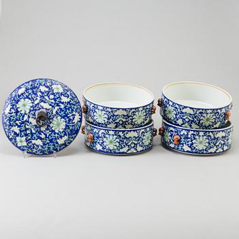 A Chinese polychrome porcelain food container, mid 20th century.