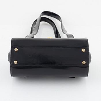 Moschino, a handbag.
