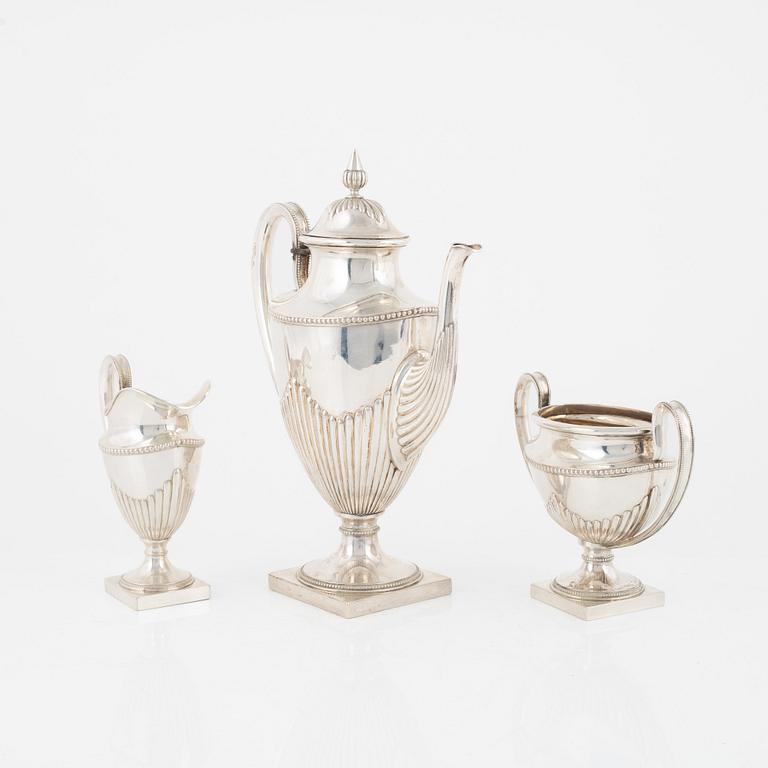 A Swedish Silver Coffee Pot, Creamer and Sugar Bowl, mark of Ludvig Axelson Jr, Stockholm 1899.